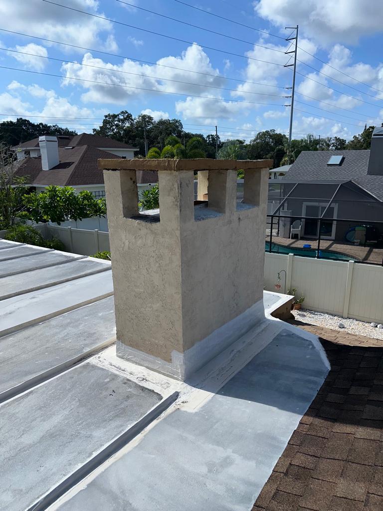 White carriage style chimney installation by Eagle Chimney Service in Maryland